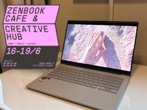 ASUS Zenbook Cafe & Creative Hub - מחשב נייד מסדרת זנבוק פתוח על שולחן לבן לצד פרטי אירוע פופ-אפ בתל אביב